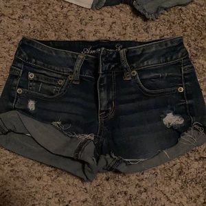 2 PAIR AE STRETCH DENIM SHORTS.